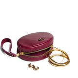 Orchid Small | Oval shaped pouches with zipper and wristlet strap open with accessories