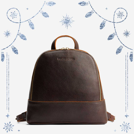 Coldbrew | Leather backpack with debossed Portland Leather logo on front, with zipper closure and straps with lobster clasps