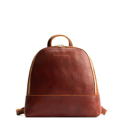 Nutmeg | Leather backpack with debossed Portland Leather logo on front, with zipper closure and straps with lobster clasps
