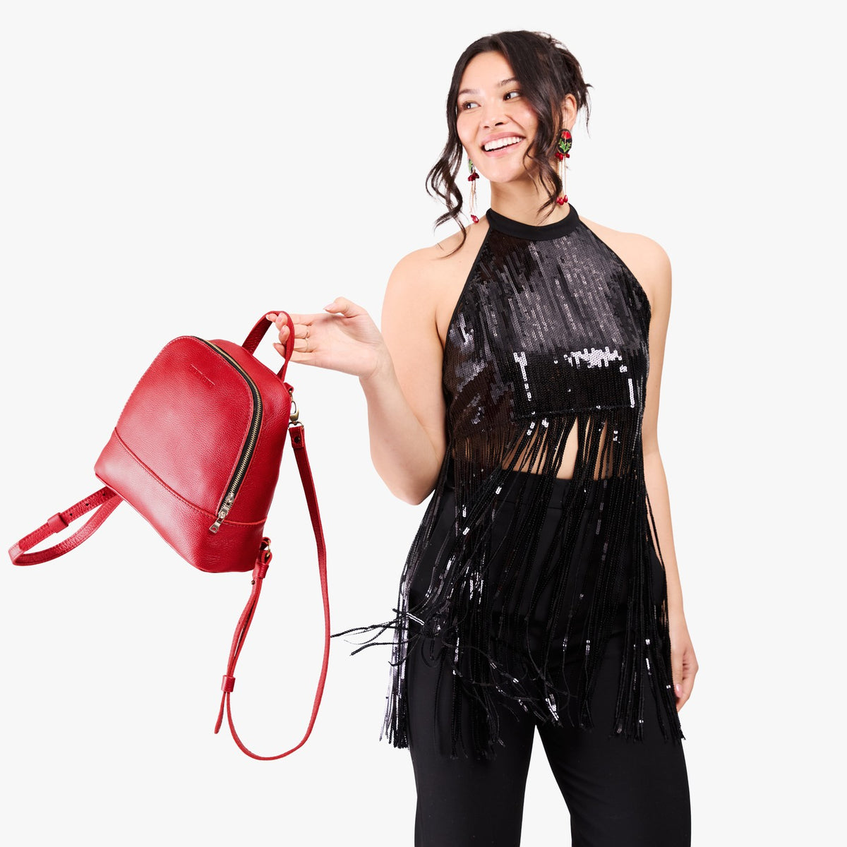 All Variants | Model carrying Rue Convertible Backpack in Reba Red