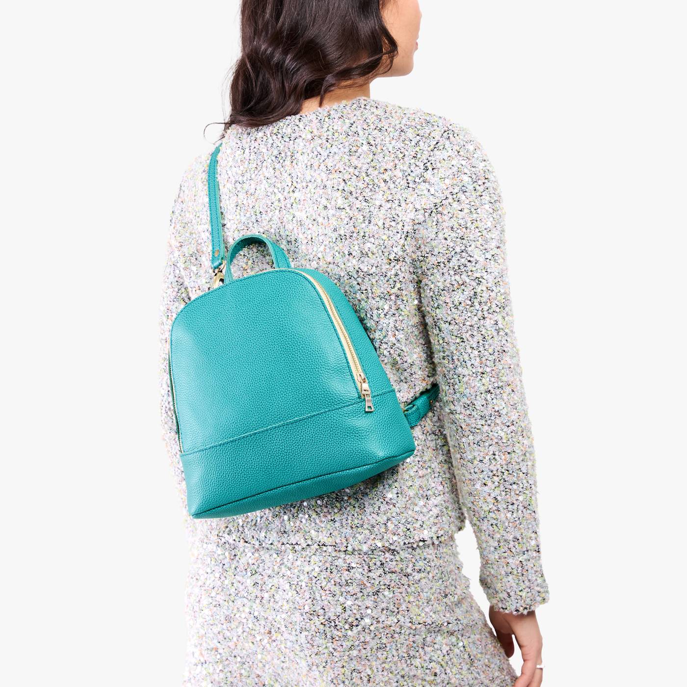 Seafoam | Model wearing leather backpack sling bag style