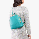 Seafoam | Model wearing leather backpack sling bag style