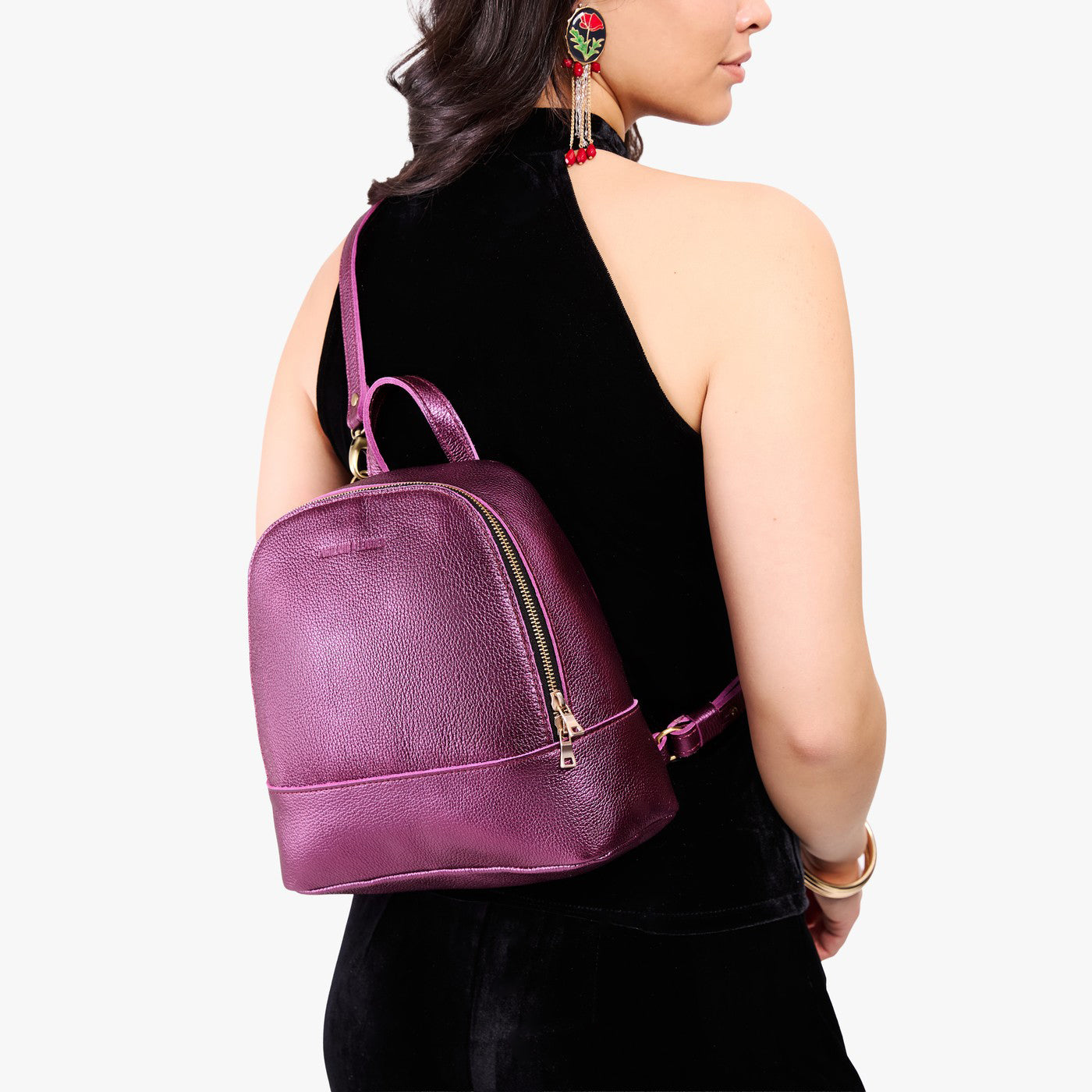 Ultra Violet | Model wearing leather backpack sling bag style