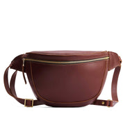 Cognac | Leather fanny pack shaped bag with a front zipper opening