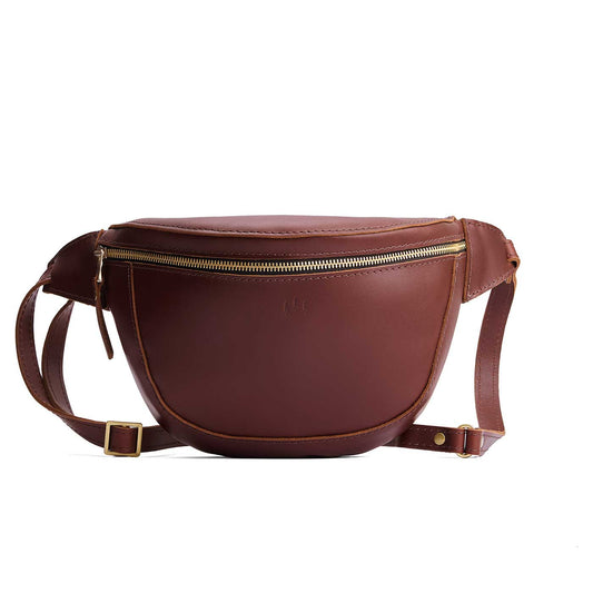 Cognac | Leather fanny pack shaped bag with a front zipper opening