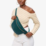 Sea Glass | Model wearing a sling bag with front zipper