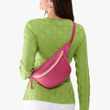 Wild Rose | Model wearing a sling bag with front zipper