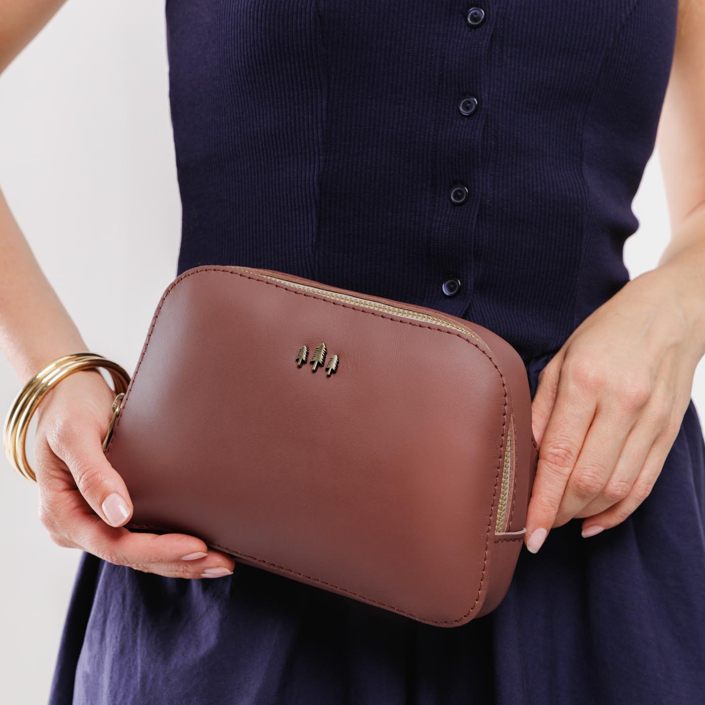 Sunkissed | Model wearing sling bag on waist