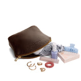 Coldbrew Large | Seashell shaped leather makeup bag with curved top zipper and flat bottom