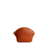 Sienna Small | Seashell shaped leather makeup bag with curved top zipper and flat bottom