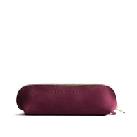 Superbloom | Leather pouch with curved seams and top zipper