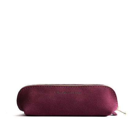 Superbloom | Leather pouch with curved seams and top zipper