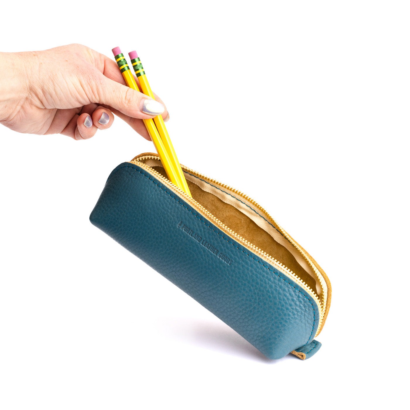 Turquoise | Leather pouch with curved seams and top zipper