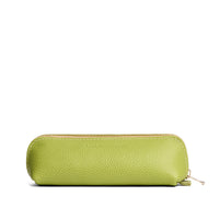 Wasabi | Leather pouch with curved seams and top zipper