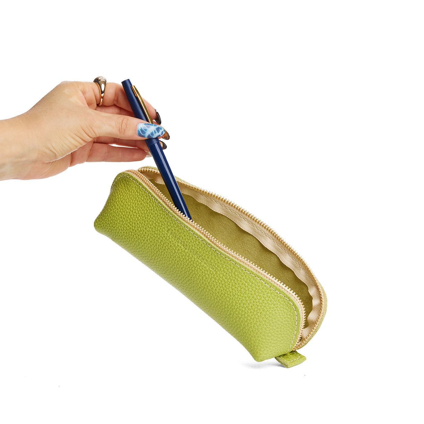 Wasabi | Leather pouch with curved seams and top zipper