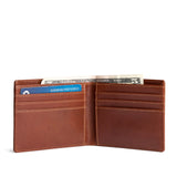 Saddlestone Deluxe | Bifold leather wallet with visible stitching on a white background