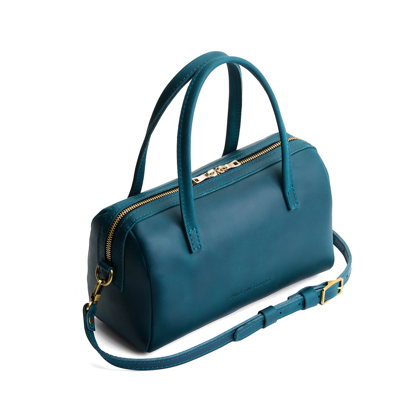 Westward Blue*Large | Mini duffle shaped handbag with crossbody strap