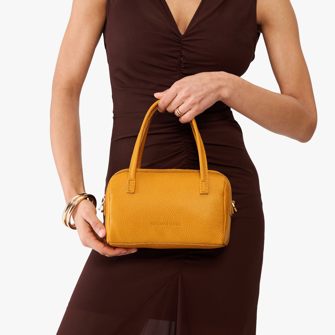 Sunshine*Small | Woman holding Sloan Doctor Bag