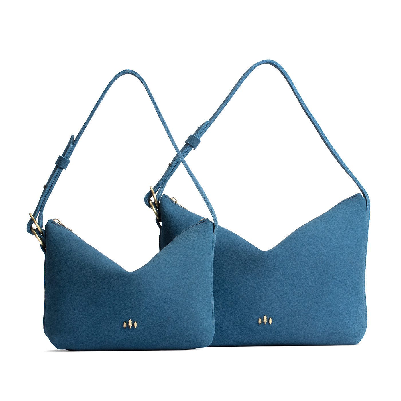 Mariner Blue | Size comparison shot of small and large slouchy leather shoulder bags with zipper opening and three metal tree emblems