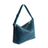 Lagoon Large | Medium sized slouchy leather shoulder bag with zipper opening and three metal tree emblems
