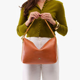 Sienna Large | Medium sized slouchy leather shoulder bag with zipper opening and three metal tree emblems