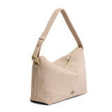 Taupe Large | Slouchy Shoulder Bag that has a zipper opening and three metal tree emblems on a white background