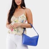 Astro Blue Small | Petite slouchy leather shoulder bag with zipper opening and three metal tree emblems
