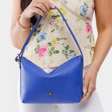 Astro Blue Small | Petite slouchy leather shoulder bag with zipper opening and three metal tree emblems