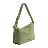 Laurel Small | Slouchy Shoulder Bag that has a zipper opening and three metal tree emblems on a white background