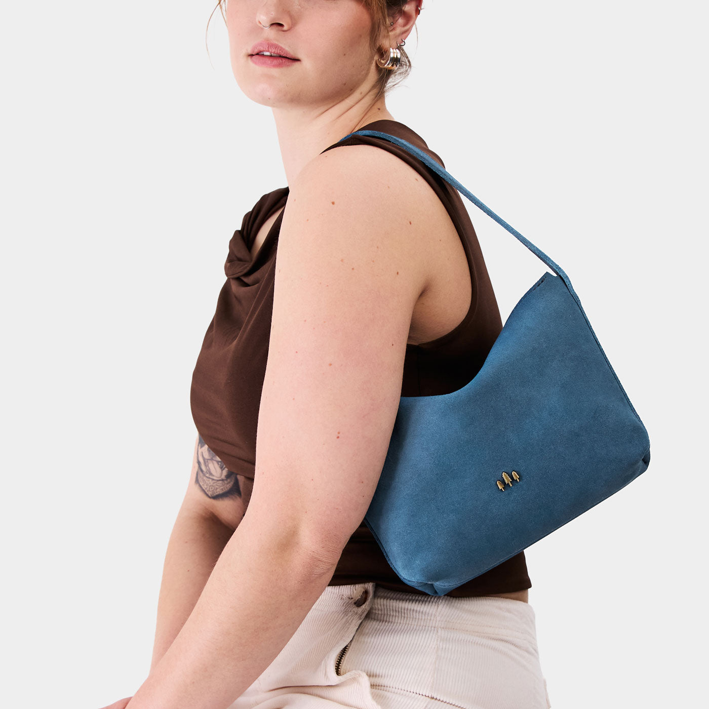Mariner Blue*Small | Petite slouchy leather shoulder bag with zipper opening and three metal tree emblems