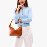 Sienna Small | Petite slouchy leather shoulder bag with zipper opening and three metal tree emblems