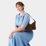 Stagecoach Small | Petite slouchy leather shoulder bag with zipper opening and three metal tree emblems