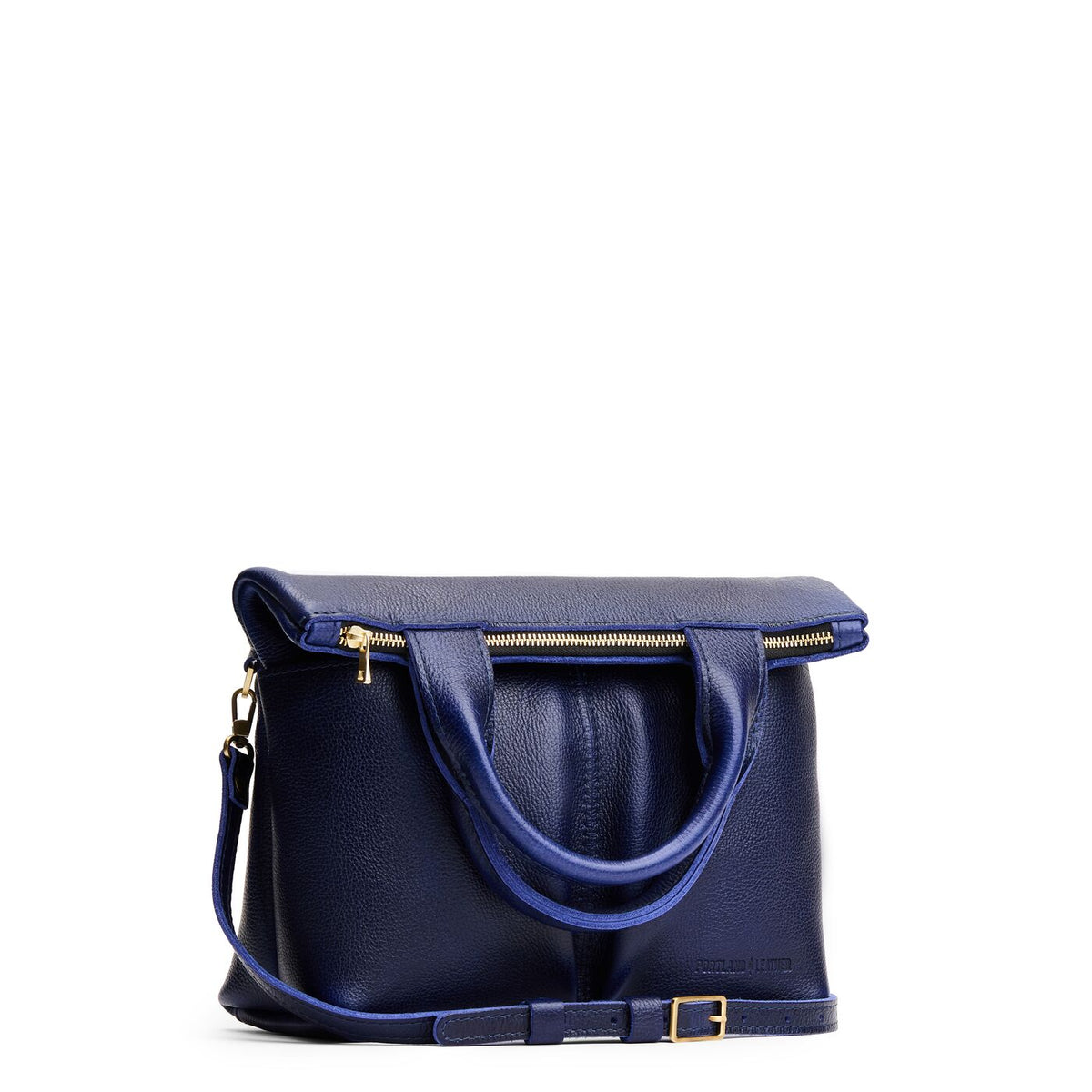 Cobalt*Small | Convertible tote clutch crossbody with two large front pocket and top carry handles folded into a clutch