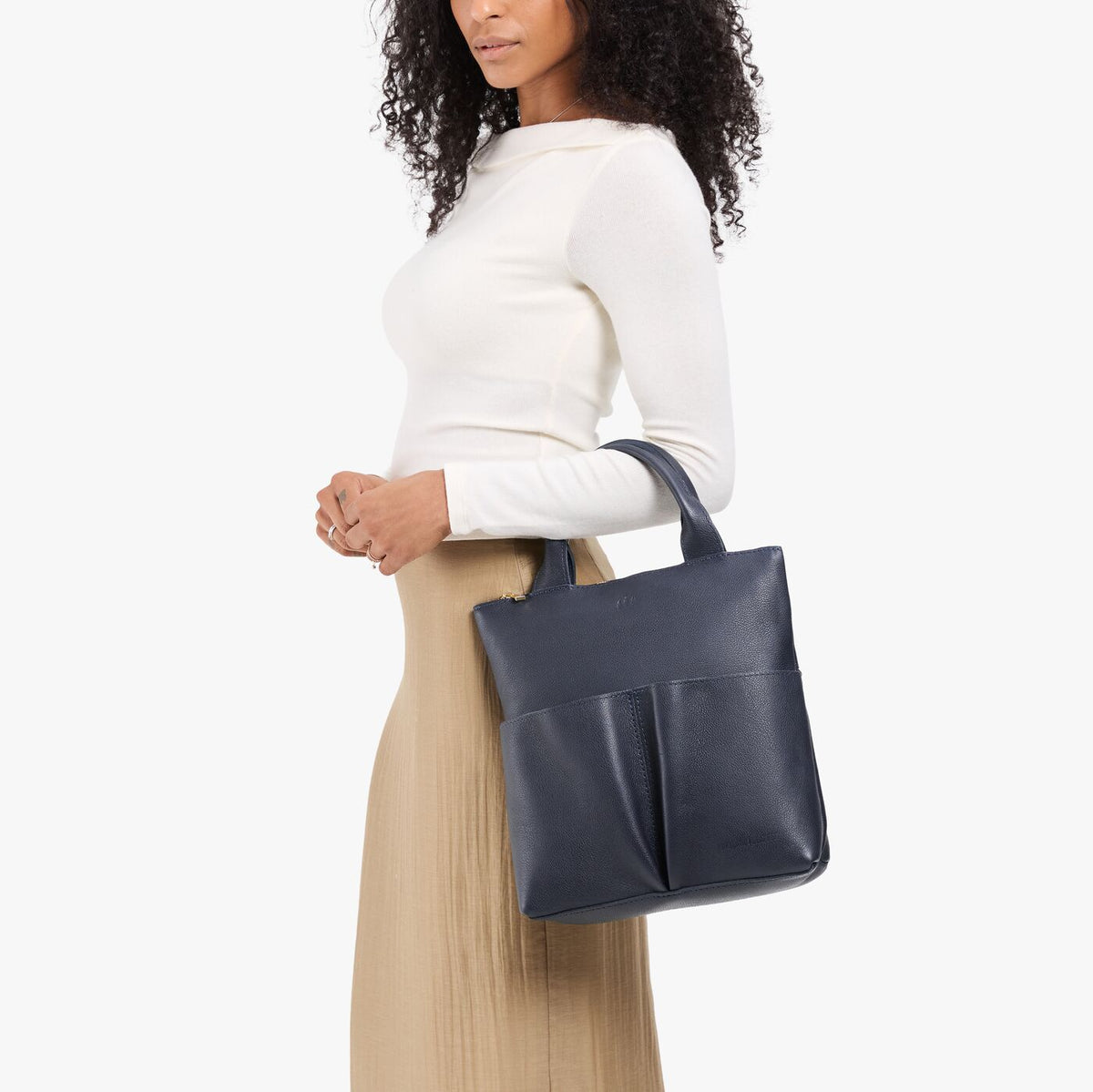 Night Owl*Small | Model wearing a convertible tote clutch crossbody