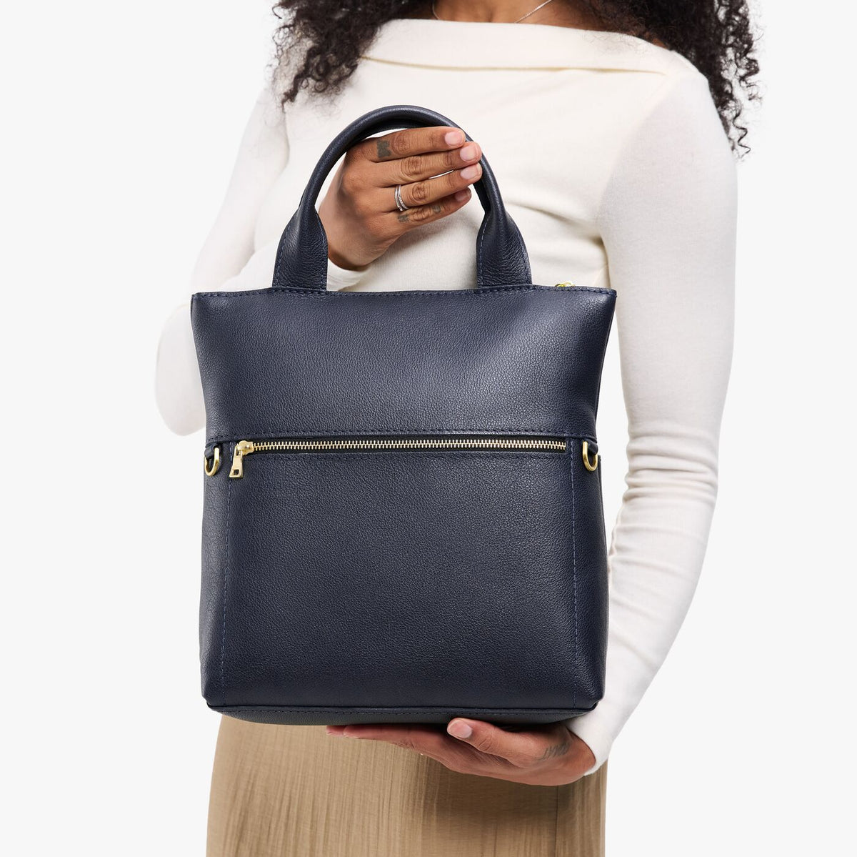 Night Owl*Small | Model wearing a convertible tote clutch crossbody