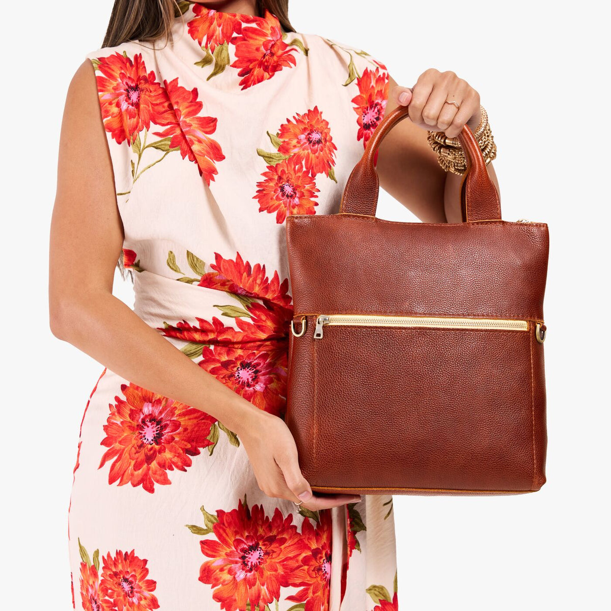 Nutmeg*Small | Model wearing a convertible tote clutch crossbody