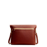 Nutmeg Small | Convertible tote clutch crossbody with a back zipper pocket folded into a clutch