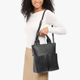 Pebbled--black Small | Model wearing a convertible tote clutch crossbody
