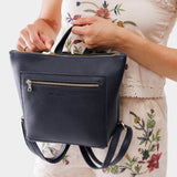 Night Owl Small | Model wearing square slim leather tote backpack 