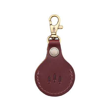 Cognac | Round leather AirTag holder with snap closure and swivel lobster claw clasp