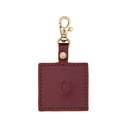 Cognac | Square-shaped leather AirTag holder with snap closure and swivel lobster claw clasp