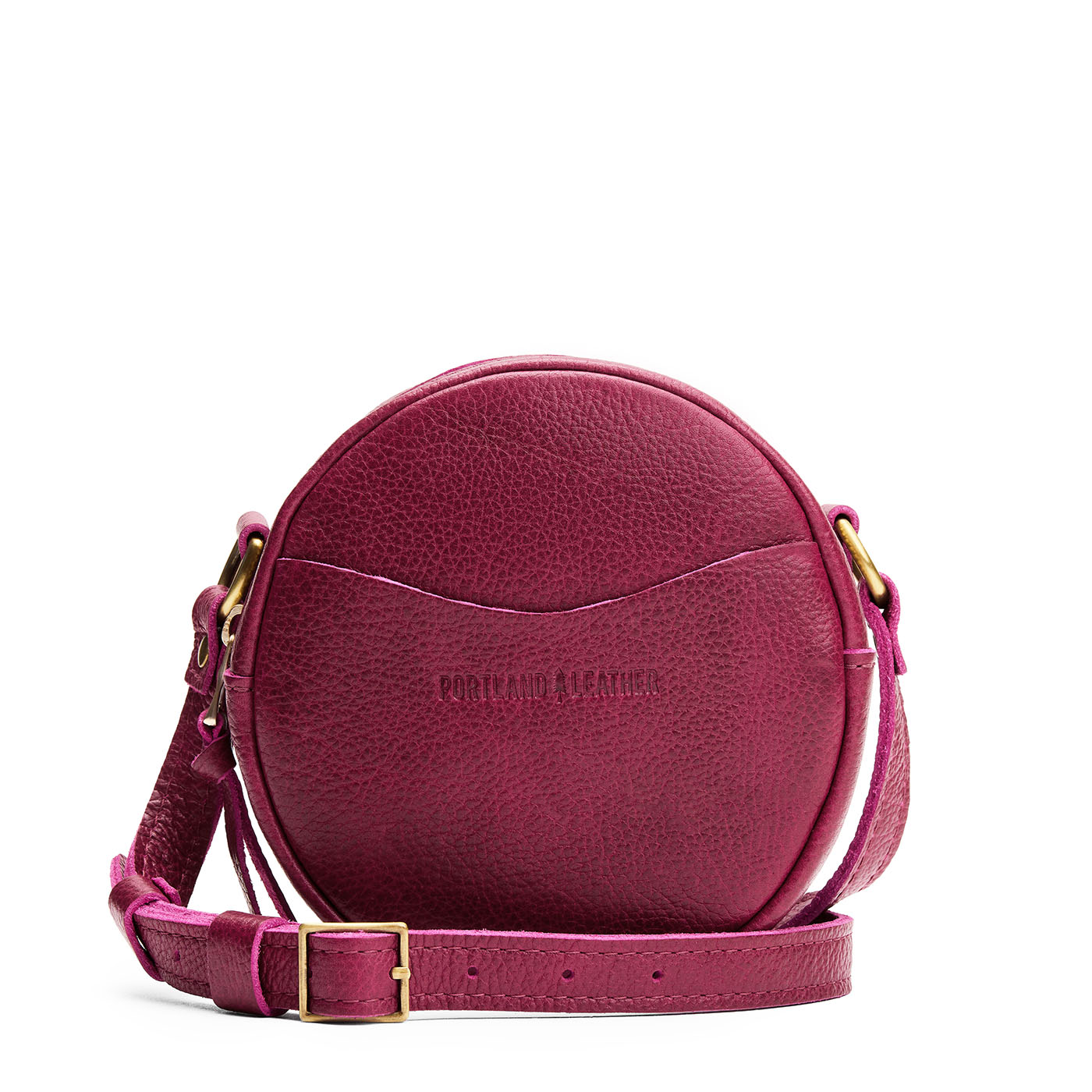 Orchid | Circle shaped crossbody bag with top zipper and gold accents