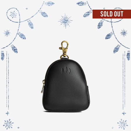 Black | Leather keychain pouch with zipper top, swivel lobster clasp, and debossed emblem of three PLG trees