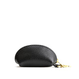 Pebbled--black | Taco shaped leather pouch with zipper and swivel lobster clasp on white background