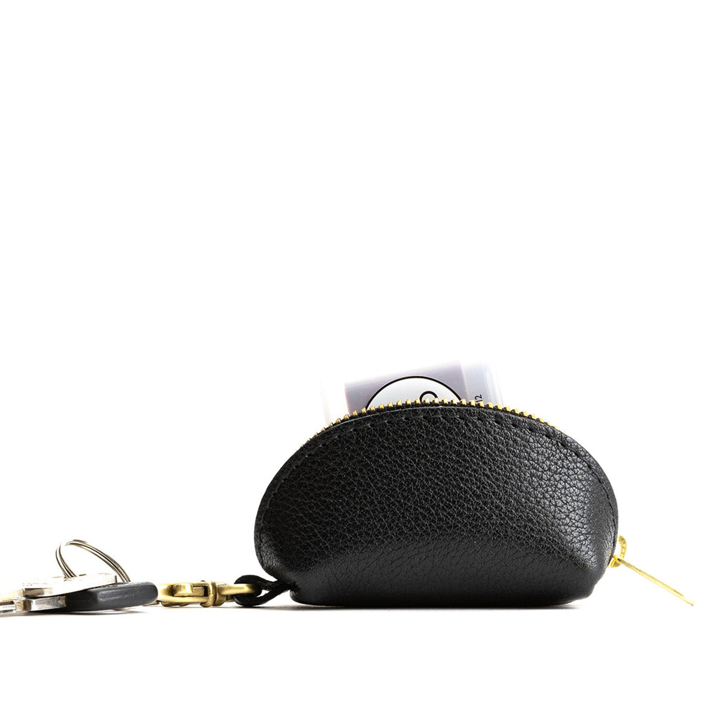 Pebbled--black | Taco shaped leather pouch with zipper and swivel lobster clasp on white background