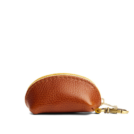 Sienna | Taco shaped leather pouch with zipper and swivel lobster clasp on white background