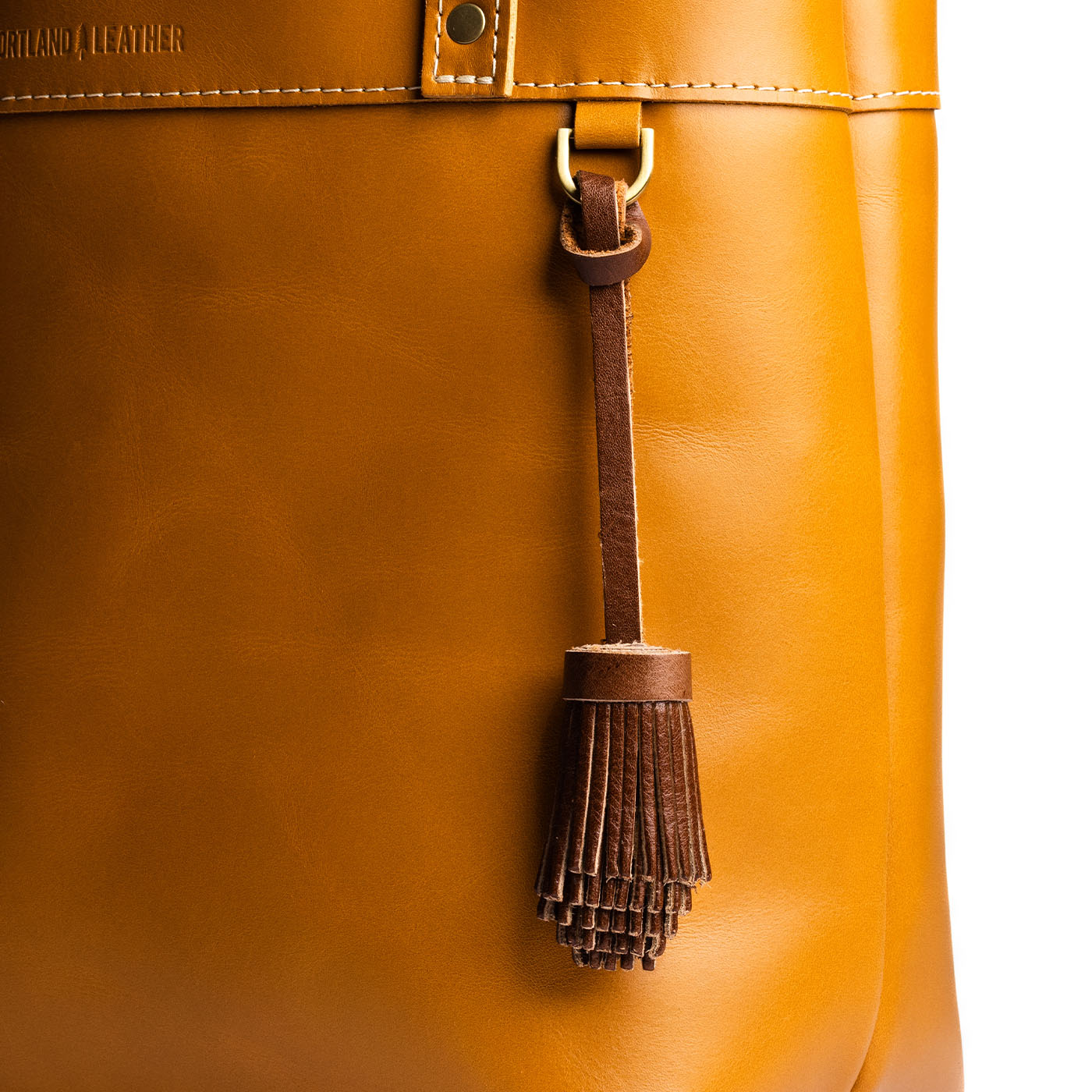 Carajillo | Pom-pom style with tiered leather fringe