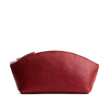 Chili Red Total Eclipse | Spacious leather makeup bag with curved seams and top zipper