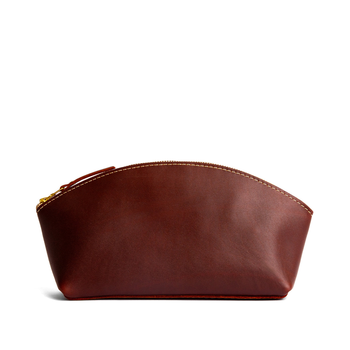 Cognac*Total Eclipse | Spacious leather makeup bag with curved seams and top zipper