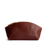Cognac Total Eclipse | Spacious leather makeup bag with curved seams and top zipper